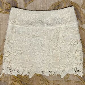 Gianni Bini - white mini skirt with lace overlay. Size S